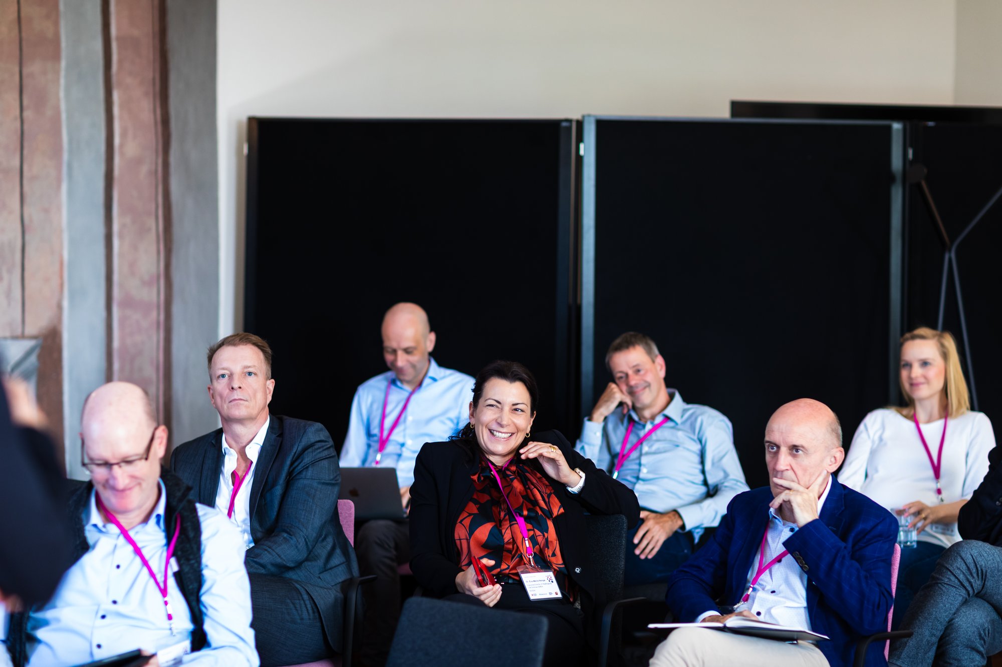 Dr. Eva-Maria Hempe smiling in the audience of Software als Management-Task in Schloss Fürstlich Drehna Dr. Eva-Maria Hempe smiling in the audience of Software als Management-Task in Schloss Fürstlich Drehna
