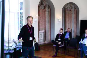 Dr. Jürgen Müller presenting at historic castle Fürstliche Drehna for the Software Excellence Network